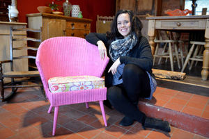 Adele Fint and a pink wicker chair for sale on the website Reclamation Shop