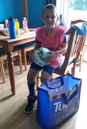 Corbin Davies was delighted with his gifts from the Town manager