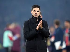 Mikel Arteta applauds the fans