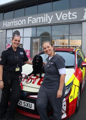 Watch Commander Annette Carrington with Holly and clinic director and vet Rosie Levene-Barr, from Harrison Family Vets in Kingswinford.
