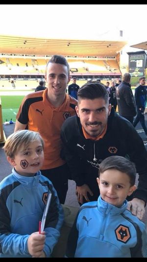 Boys with the players