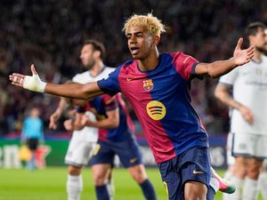 Lamine Yamal celebrates scoring Barcelona's first goal