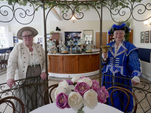 Llandrindod Wells Victorian Festival Chairman Anne Smith and Llandrindod Wells Town Crier Jan Swindale preparing for an afternoon tea dance and an afternoon tea and soiree at the newly opened Chalybeate Tea Rooms in the Rock Park, during Victorian Festival week. Image by Andy Compton