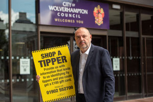 Councillor Craig Collingswood, cabinet member for environment and climate change at Wolverhampton Council, with details of the Shop a Tipper scheme