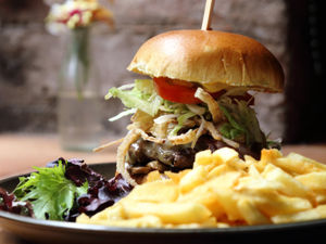 Supporting image for story: Food review: Burgers roar at Lyons’ Den