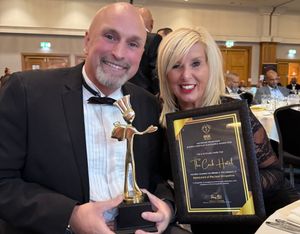 Simon and Louise with the award this week