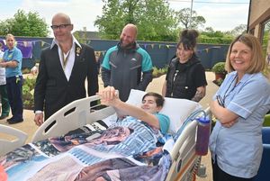 Harry Hill with patient Leo Gunning, and parents Chris and Stacey, who are from Wombourne.