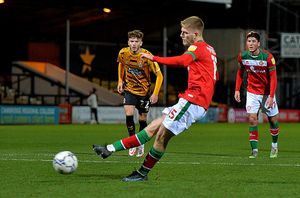 Kieran Phillips misses his penalty.