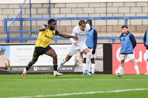 Dylan Allen-Hadley goes past Fylde’s Lincoln Mcfayden Picture: Kieren Griffin
