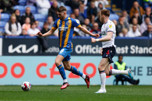 Tom Bloxham of Shrewsbury Town and George Johnston of Bolton Wanderers (AMA)