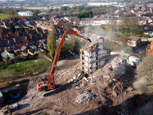 Supporting image for story: Work progressing on high-rise flat blocks demolition in Netherton