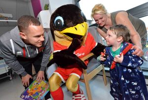 Swifty and Kieron Morris with Lisa Holwell and Brody Ramsden, 2, from Shelfield
