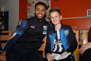 James Dobbins, 10, with Darnell Furlong. Photo: AMA