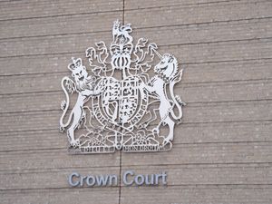 Coat of arms outside Cambridge Crown Court