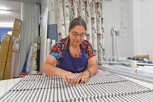 Mia working on a commission