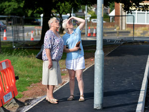 Supporting image for story: Council left red-faced after laying new footpath THROUGH lamp post
