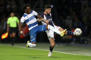 Moses Odubajo of Queens Park Rangers and Alex Mowatt (Photo by Adam Fradgley/West Bromwich Albion FC via Getty Images).