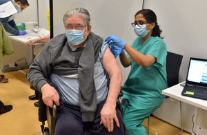Colin Day, 85, from Bloxwich, receives a vaccine from Dr Lata Nair