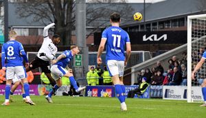 Daniel Kanu halves the deficit with his 15th goal of the season in all competitions.