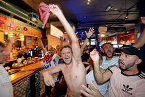 Fans celebrate England going 1-0 up at the Royal London pub, Wolverhampton