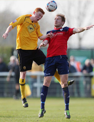Reece Flanagan of Leamington and Mike Grogan of AFC Telford United