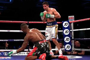Gut check - Andrew Robinson climbs back to his feet after Frank Buglioni's blow lands flush on his chin.