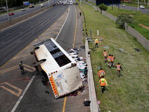 Supporting image for story: 16 dead and dozens injured after bus overturns on South African highway