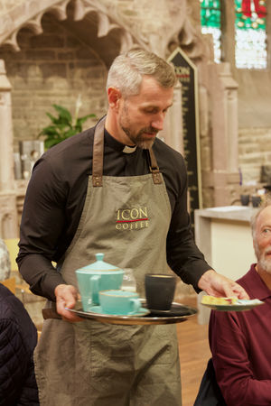 The Rev Kelvin Price serves coffee as well as God
