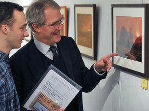 Supporting image for story: MP visits young photographer's Market Drayton exhibition