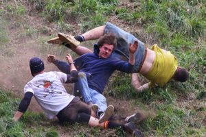 Contestants take part in the annual Cheese Rolling Race at Coopers Hill in Brockworth, Gloucestershire this Bank Holiday Monday. May 26 2025.