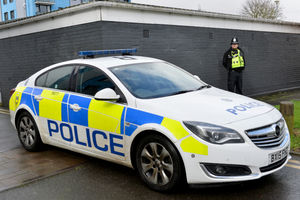 A police car was parked outside the home in West Bromwich today