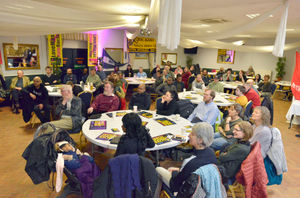 People listen to the debate