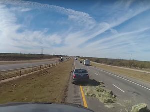 Supporting image for story: Watch as trucker takes quick action to avoid huge crash