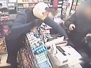 Supporting image for story: 'This was a nasty robbery': Police hunt masked raiders who struck shop worker with hammer