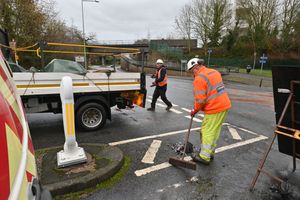 Clean up at the Hadley park Road Junction, Hadley, Telford, after a crash leaves oil on the road.