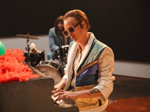 Supporting image for story: Cara Delevingne plays Elton John in Step Into Christmas video