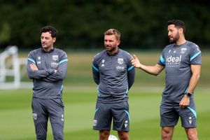 New head coach Ryan Mason, left, watches on with existing staff members James Morrison and Damia Abella. (Photo by Adam Fradgley/West Bromwich Albion FC via Getty Images)