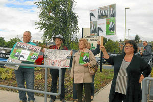 Protesters gathered as Mr Paterson opened the new Oswestry Health Centre