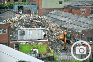 Ranbir 'Nick' Singh and his father Balwant 'Bob' Singh Bagrhia filled a yard to the rafters with household and industrial waste