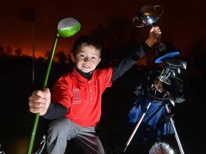 Supporting image for story: Move over, Tiger! Golfer James, nine, is on the fairway to heaven