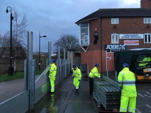 Supporting image for story: Shrewsbury flood barriers come down - with video and pictures