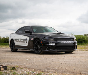 The UK vs USA Police Pursuit Driving Experience includes a British BMW Police Interceptor and an American Dodge Charger V8 Interceptor  