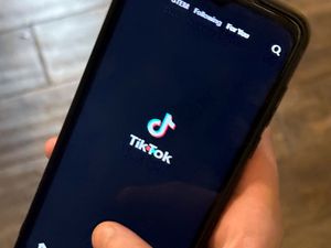 The TikTok app logo displayed on a mobile phone screen