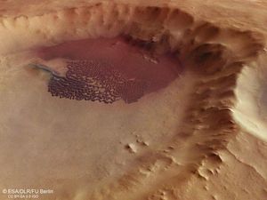 Supporting image for story: There are some stunning new images of Mars’ windswept impact craters
