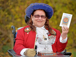 Supporting image for story: Prestigious award for Shrewsbury town crier's consort