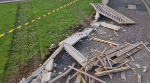 A fence destroyed by the truck