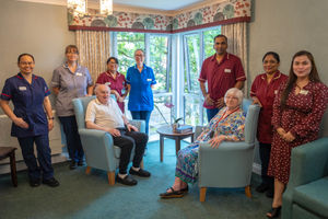 Home Manager Rhea Paller and her team with residents