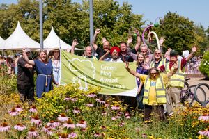 Telford Town Park raising the flag after being award the Green Flag Award 2022.