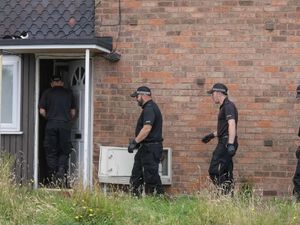 Officers searching the Caddick Crescent home after Harleen's death