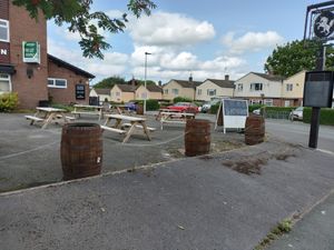 Outside the pub after the work